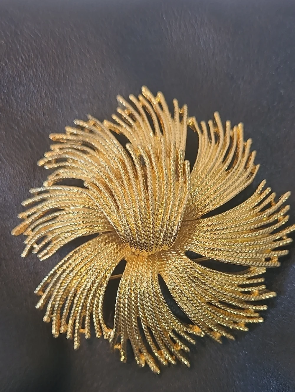 Monet Vintage Cordelia Gold Tone Starburst Brooch with Textured Metal Threads